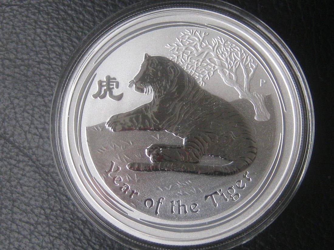  1 Dollar Lunar II Serie 2010; Tiger 1 Unze Bullion Münze; in Originalkapsel, stempelglanz (2)   