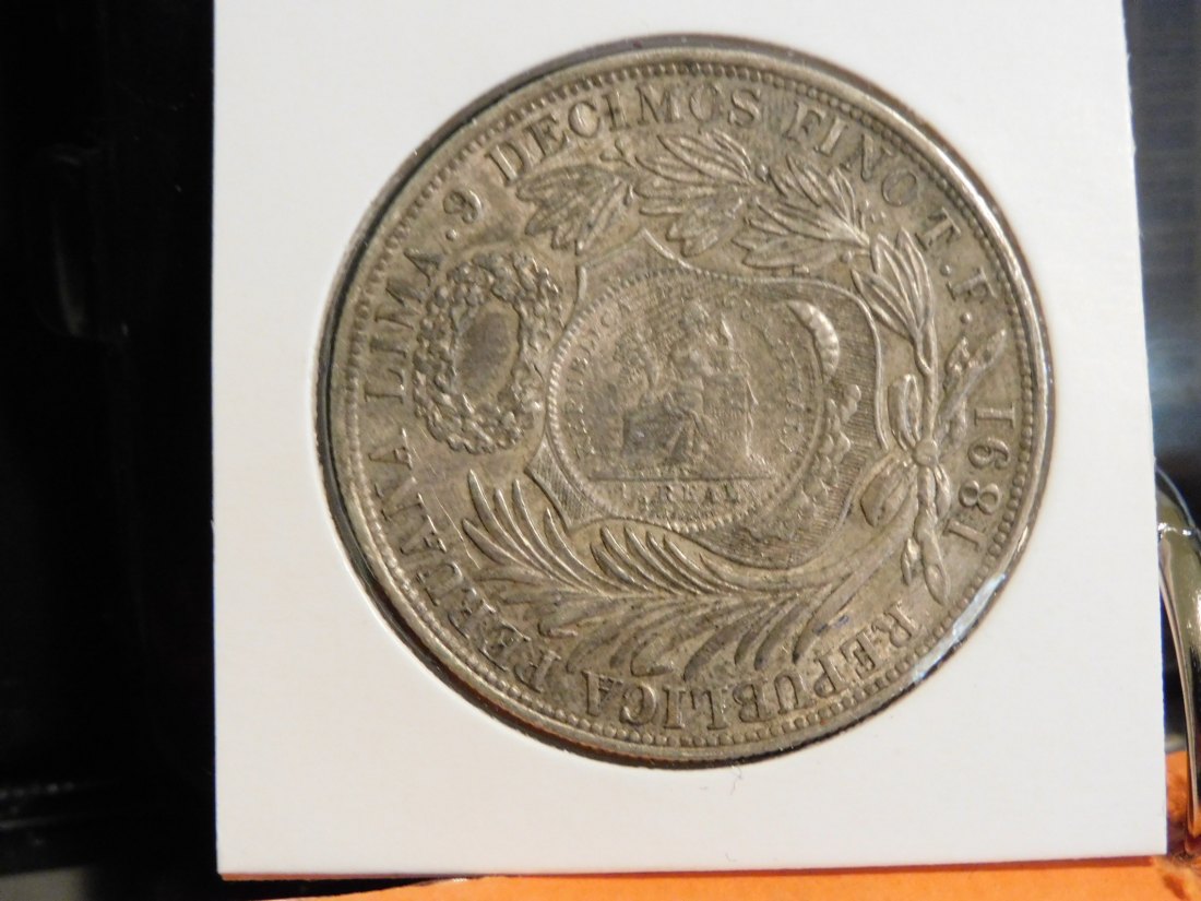  GUATEMALA 1 PESO 1894 COUNTERSTAMP IN PEROU 1891 SOL COIN.GRADE-PLEASE SEE PHOTOS.   